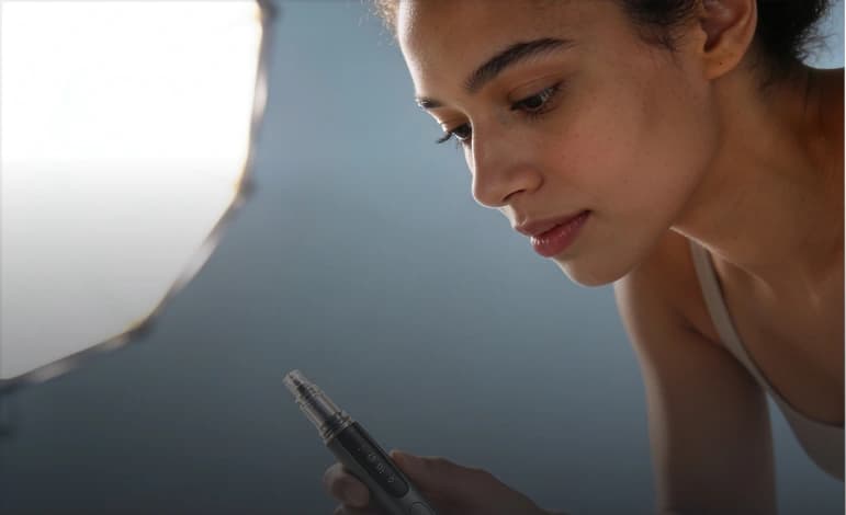 Patient reviewing a GLP-1 injection pen before a weight loss consultation